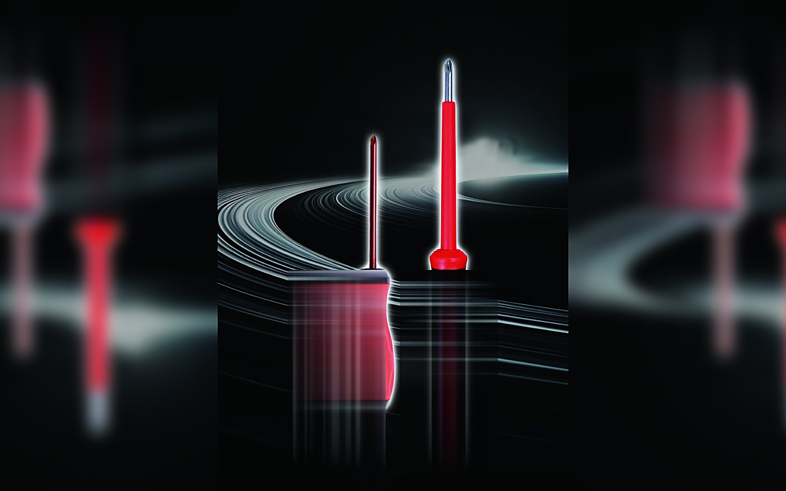 Voltage tester screwdrivers on a dark studio background