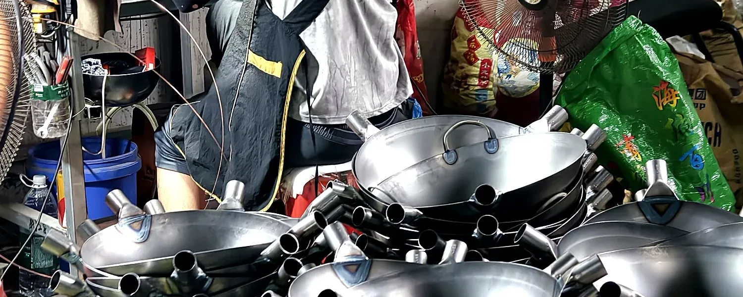 Hand-polishing quality inspection station where surface and weld points are checked on custom orders.