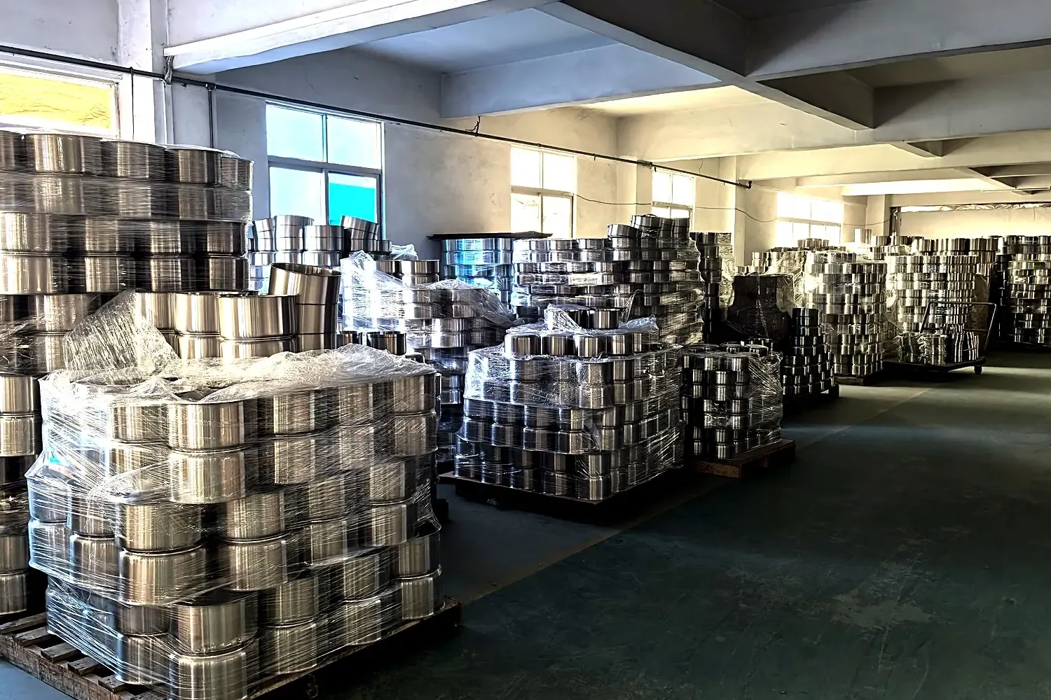 Finished-goods warehouse where custom-packed private label orders are consolidated by batch before dispatch.