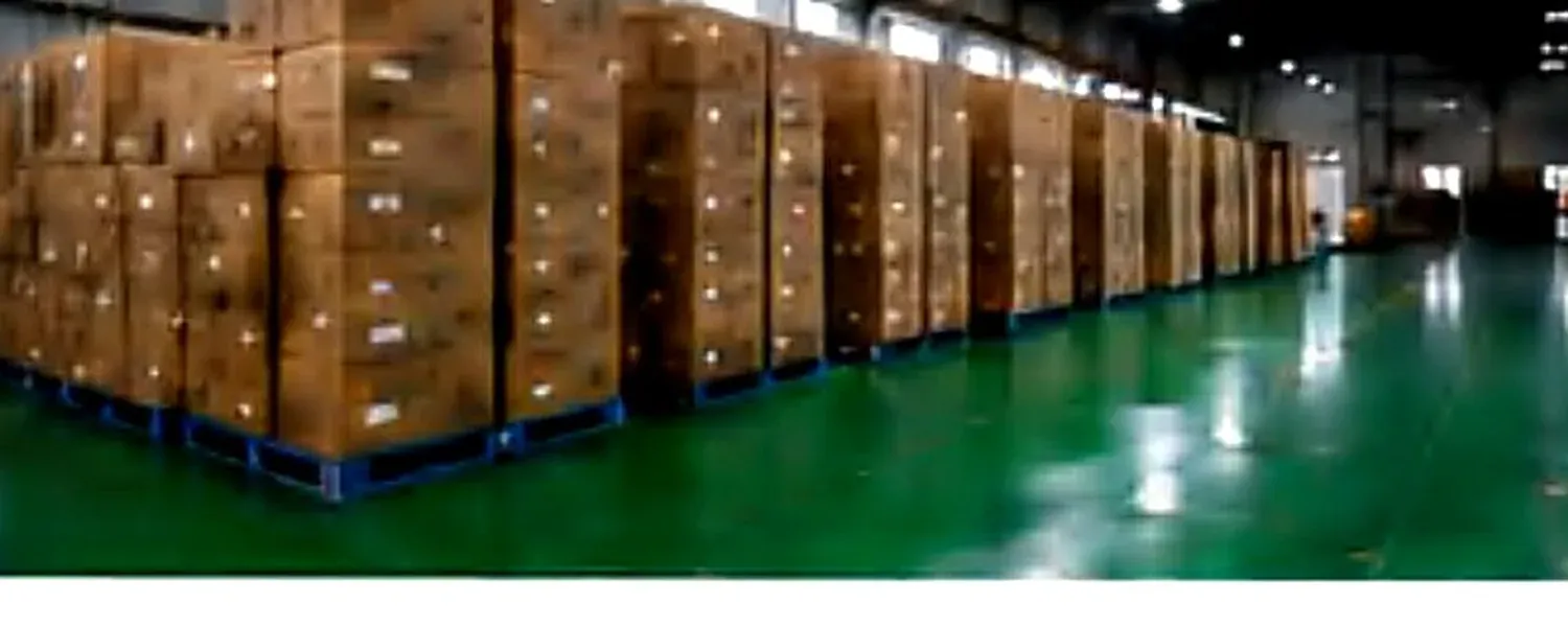 Packed cartons staged in the YIHENG finished-goods warehouse before container loading.