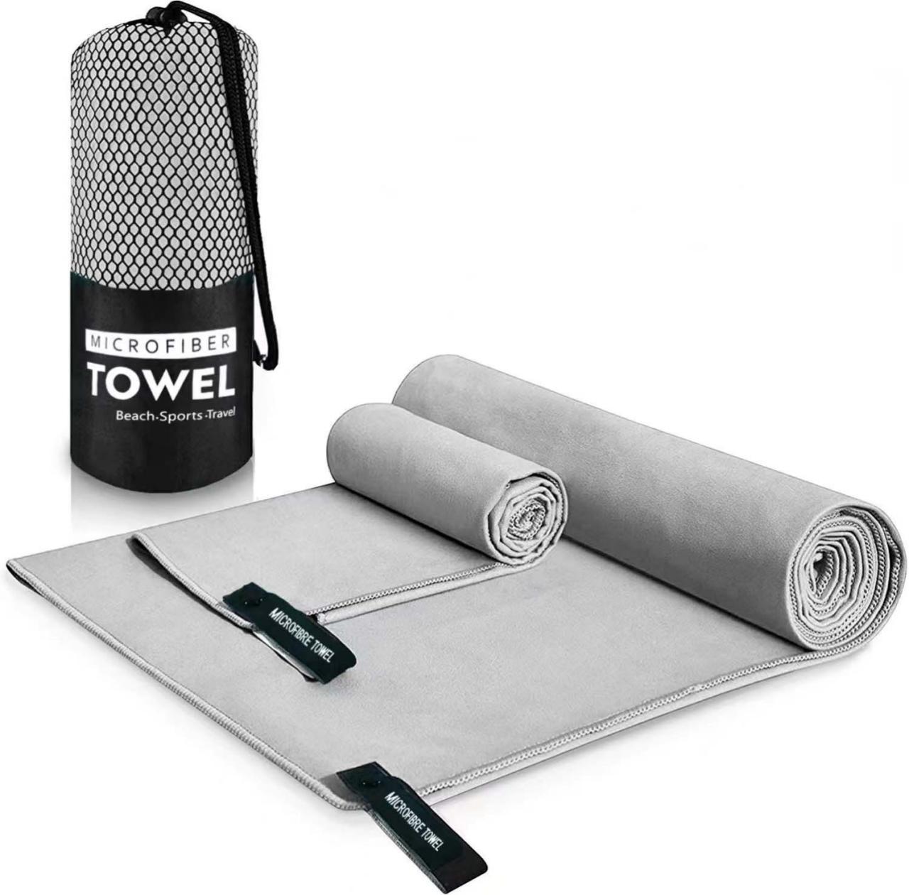 Gray microfiber towel rolled with a mesh carry bag