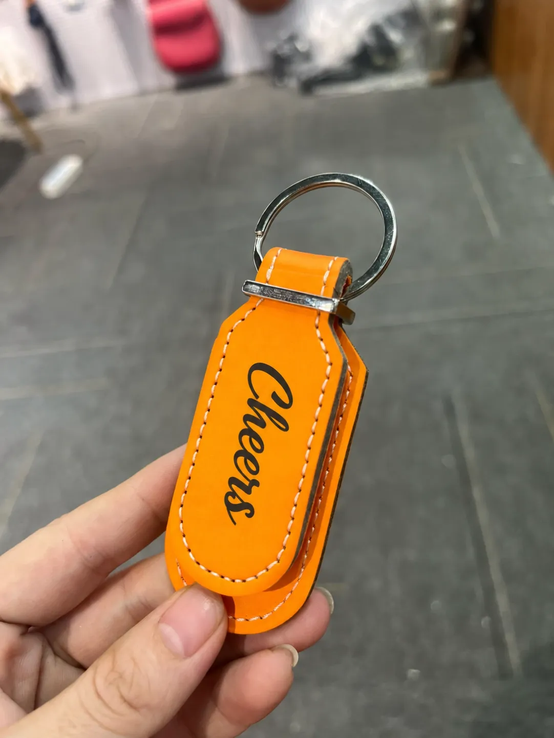custom-orange-oblong-luggage-tag-handheld.png