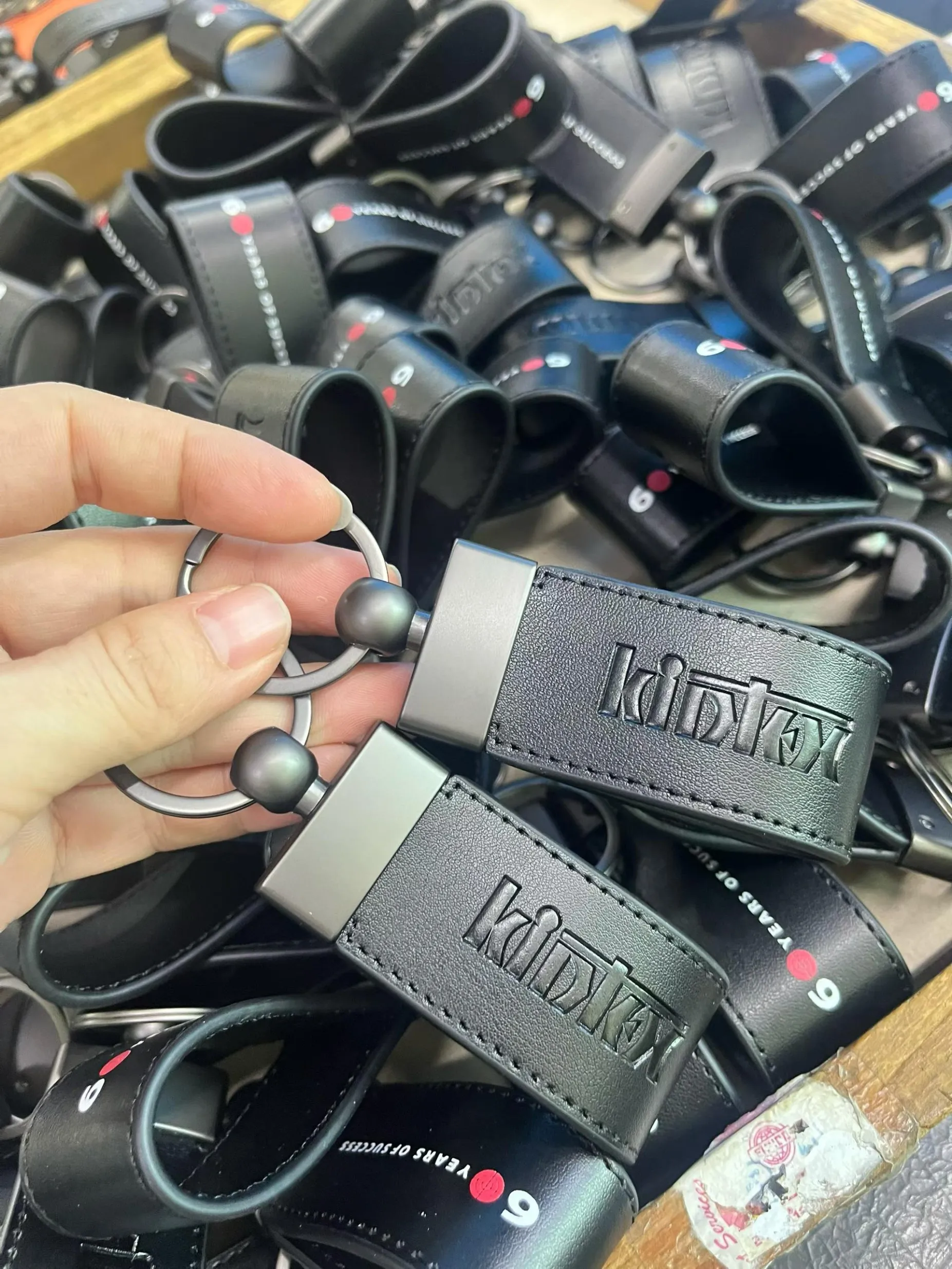 custom-gray-leather-logo-keychain.jpg