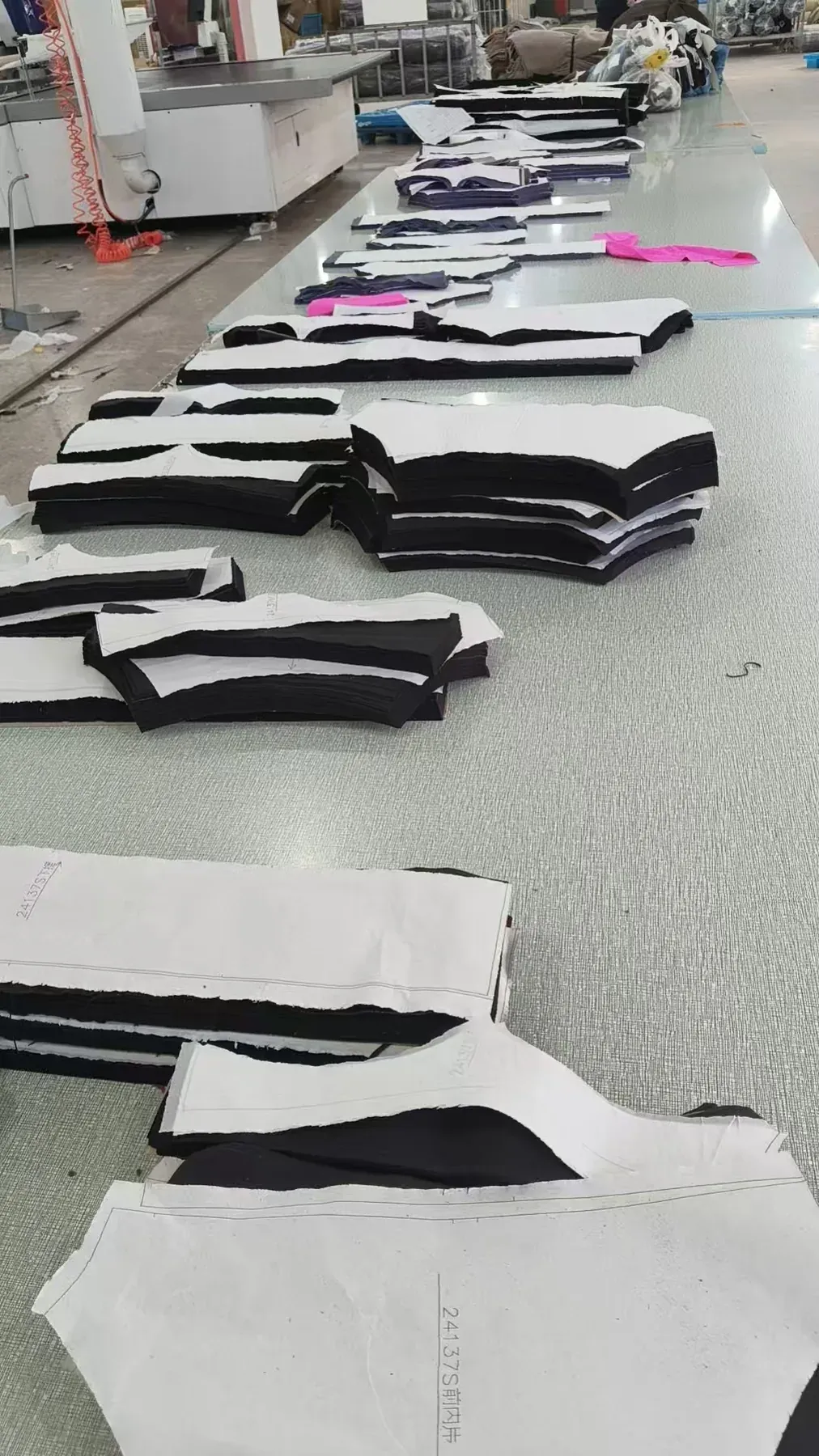 Fabric cutting process for custom activewear sampling and production