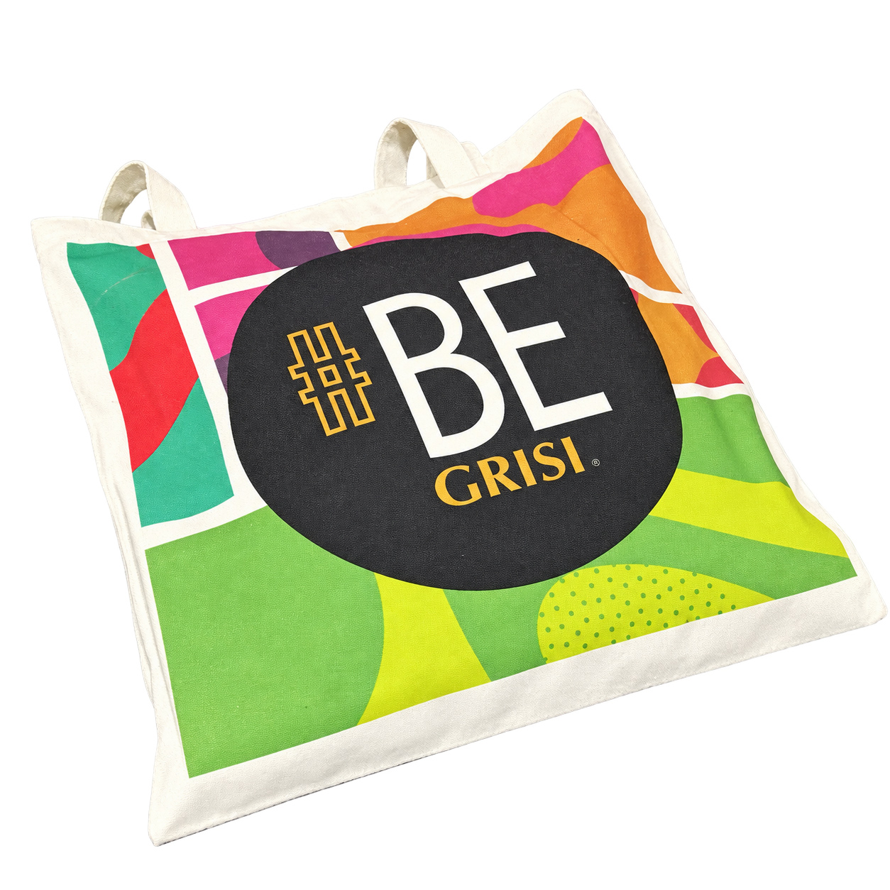 Angled view of printed canvas tote bag with long shoulder handles