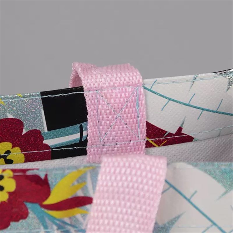 Reinforced handle stitching detail of laminated shopping bag