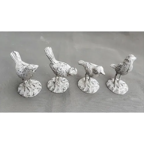 Distressed white cast iron bird statue set with base