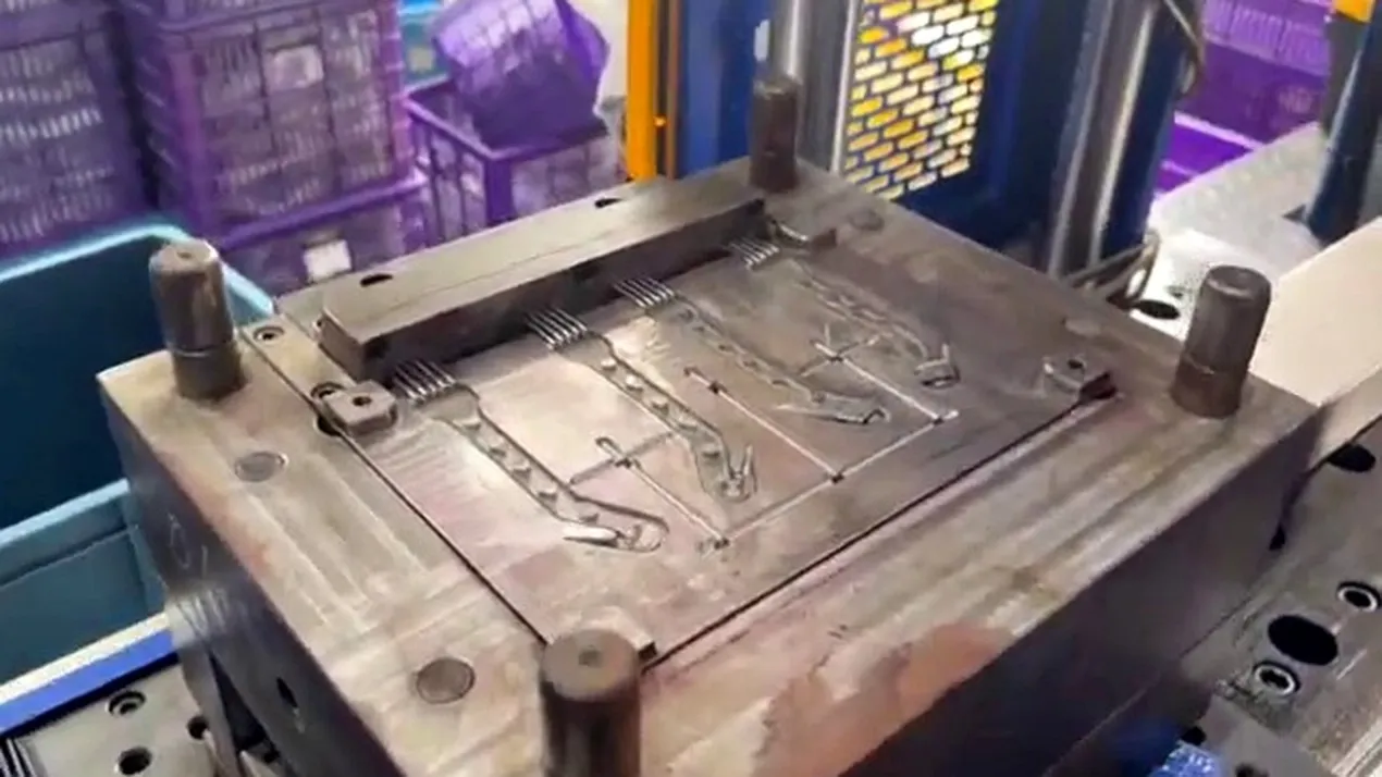 Vertical injection molding machine with mold open