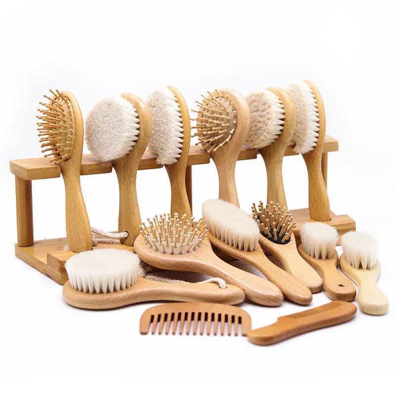 Bamboo baby brushes with soft natural bristle on wooden stands