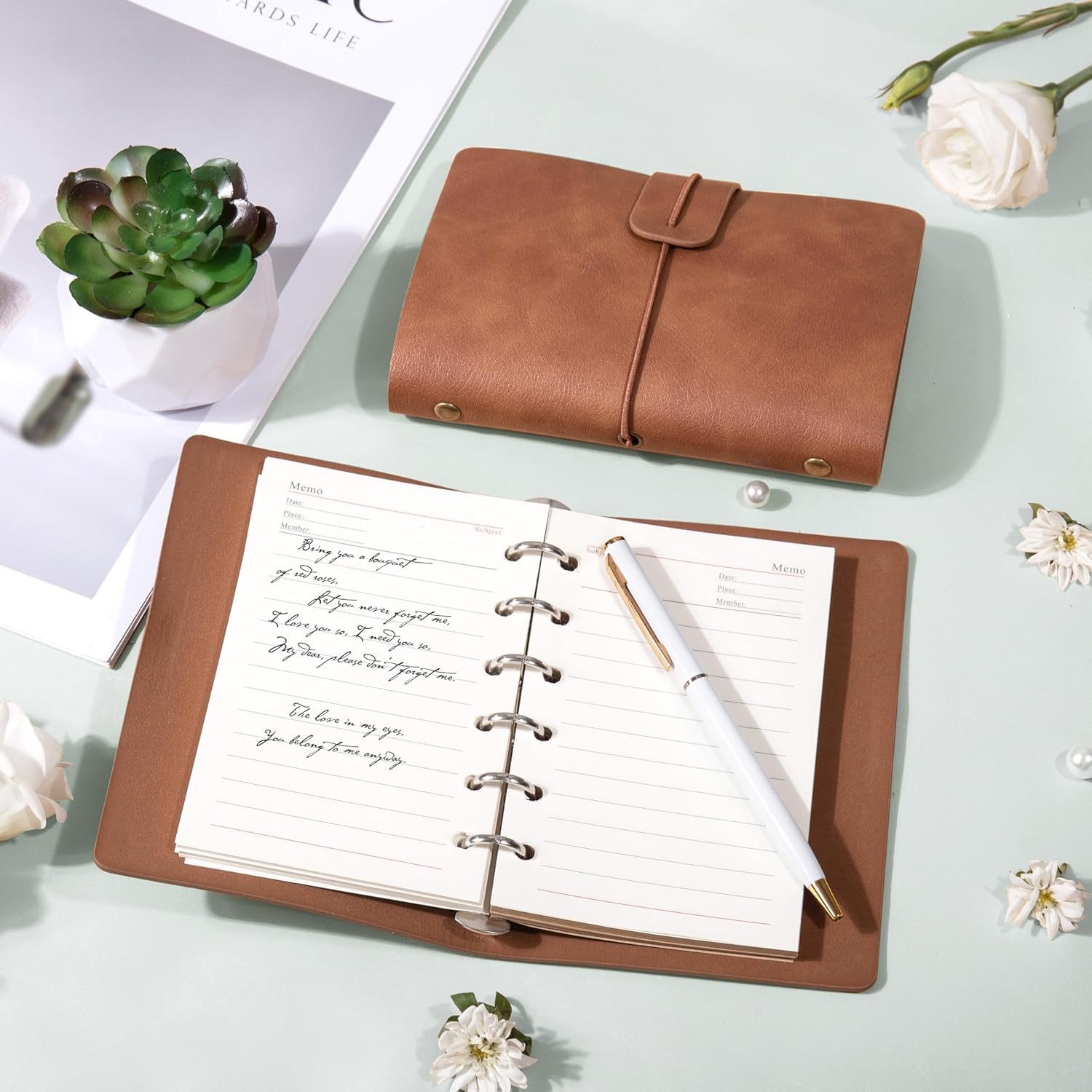 Leather-bound ring journal and pen from self-care ritual gift box